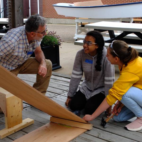 Boat school students learn from the expert