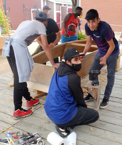 Youth participating in boat school.